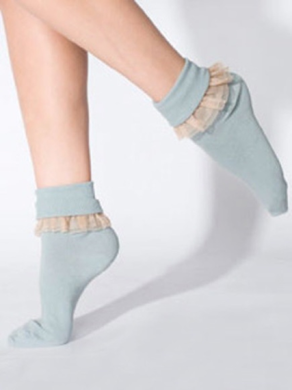 American Apparel’s Girly Lace Ankle Sock in Sea Green & Nude